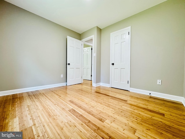 5933 Westridge Ct, Alexandria, VA 22310 - unfurnished bedroom featuring light wood finished floors
