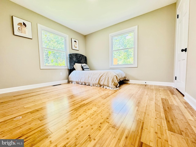 5933 Westridge Ct, Alexandria, VA 22310 - bedroom featuring hardwood / wood-style flooring and multiple windows