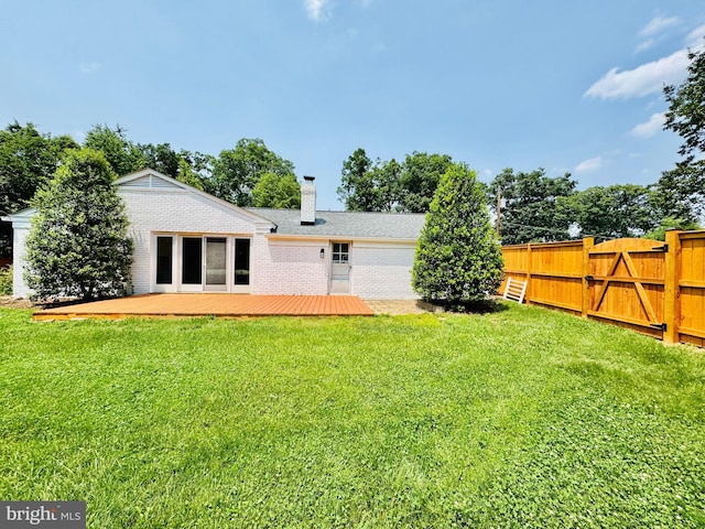 5933 Westridge Ct, Alexandria, VA 22310 - back of house featuring brick siding, a wooden deck, and a chimney