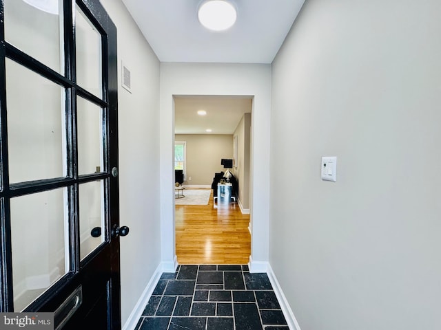 5933 Westridge Ct, Alexandria, VA 22310 - corridor with baseboards and dark stone finish flooring