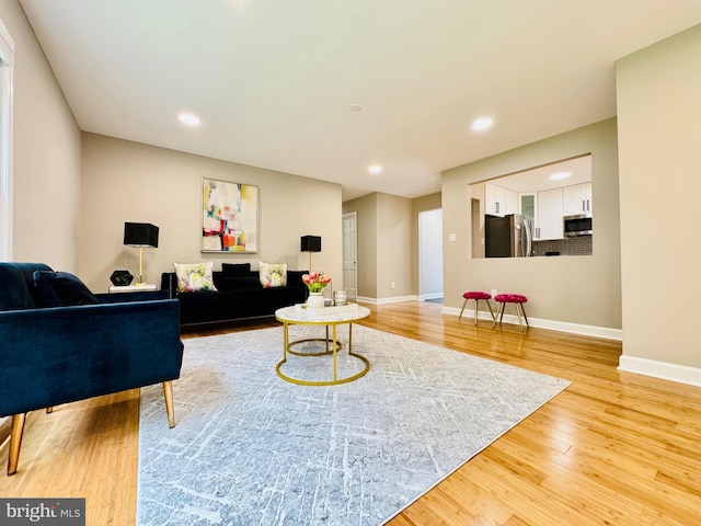 5933 Westridge Ct, Alexandria, VA 22310 - living area with light wood-style floors and recessed lighting