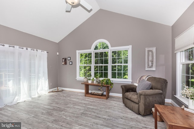 872 The Old Station Ct, Woodbine, MD 21797 - living area with high vaulted ceiling, ceiling fan, wood finished floors, and healthy amount of natural light