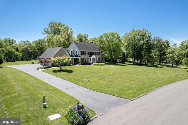 872 The Old Station Ct, Woodbine, MD 21797 - colonial-style house featuring a front lawn and driveway