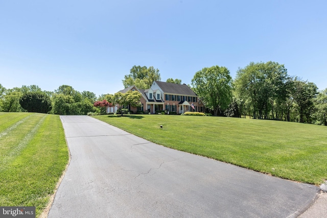 872 The Old Station Ct, Woodbine, MD 21797 - colonial house featuring a front yard and driveway