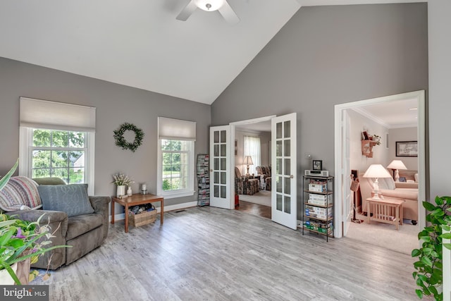 872 The Old Station Ct, Woodbine, MD 21797 - living area featuring french doors, high vaulted ceiling, wood finished floors, ceiling fan, and ornamental molding