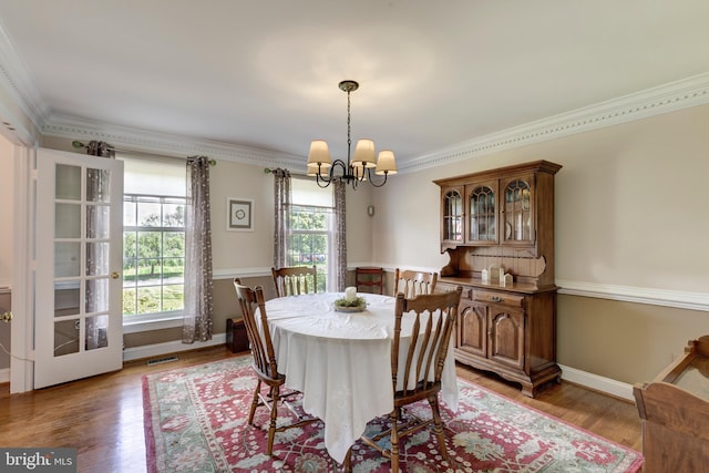 872 The Old Station Ct, Woodbine, MD 21797 - dining room featuring a chandelier, ornamental molding, and light wood-type flooring