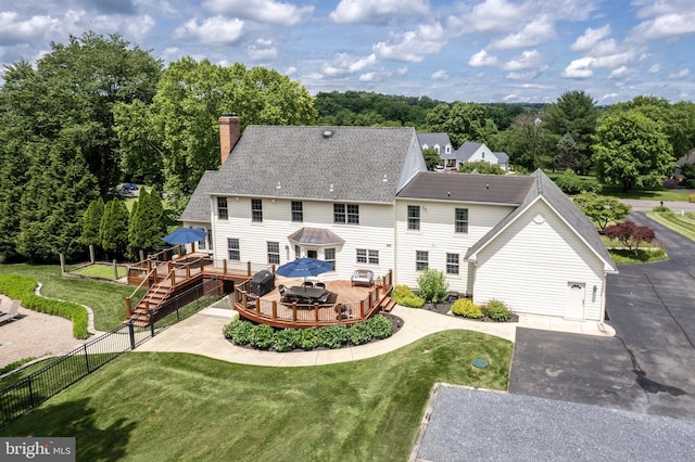 872 The Old Station Ct, Woodbine, MD 21797 - rear view of house featuring a deck, a chimney, and a shingled roof