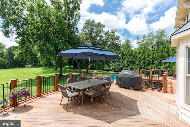 872 The Old Station Ct, Woodbine, MD 21797 - wooden terrace with outdoor dining space, area for grilling, a yard, and view of wooded area