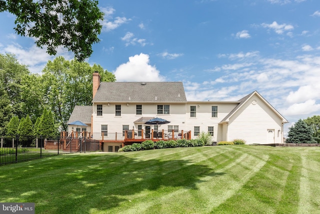 872 The Old Station Ct, Woodbine, MD 21797 - rear view of house featuring a deck, a chimney, and a shingled roof