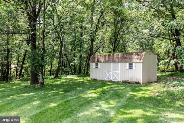 872 The Old Station Ct, Woodbine, MD 21797 - view of grassy yard with a storage unit and a view of trees