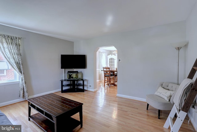 159 Garden Ridge Rd, Catonsville, MD 21228 - living room featuring arched walkways and light wood finished floors