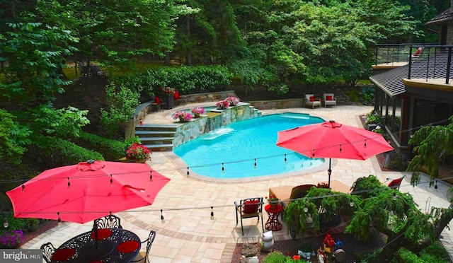 7028 Ely Rd, New Hope, PA 18938 - swimming pool featuring a patio and an outdoor hot tub
