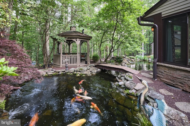 7028 Ely Rd, New Hope, PA 18938 - view of yard with a gazebo and a small pond