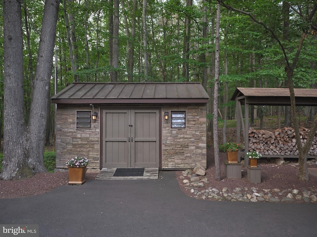 7028 Ely Rd, New Hope, PA 18938 - view of shed with a forest view