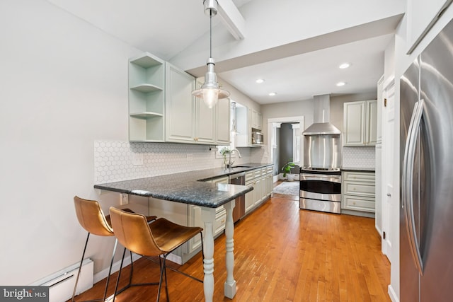 257 Merion Ave, Haddonfield, NJ 08033 - kitchen featuring appliances with stainless steel finishes, wall chimney range hood, a peninsula, open shelves, and baseboard heating