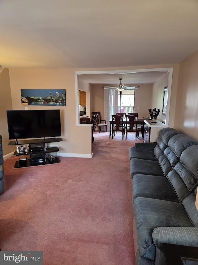 6132 Charles St, Philadelphia, PA 19135 - carpeted living area featuring ceiling fan and baseboards