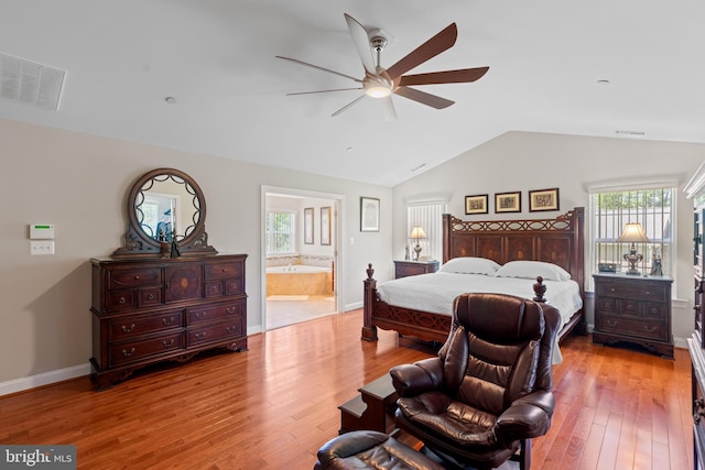 4479 Coachmans Path Ct, Waldorf, MD 20601 - bedroom featuring wood finished floors, lofted ceiling, ensuite bathroom, and a ceiling fan