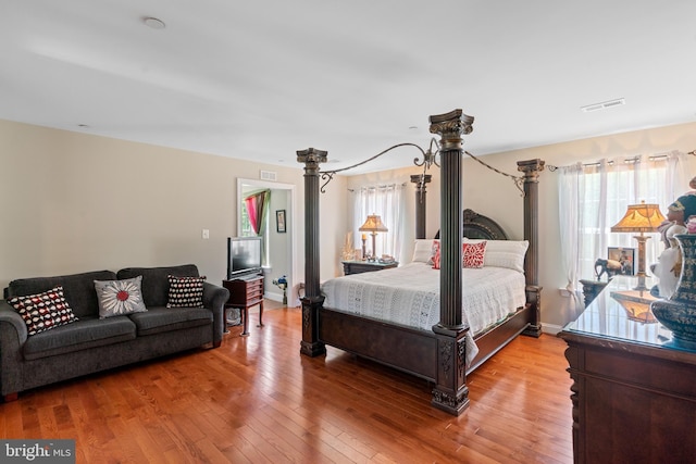 4479 Coachmans Path Ct, Waldorf, MD 20601 - bedroom featuring light wood-style floors and baseboards