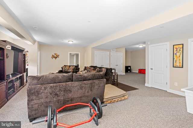 4479 Coachmans Path Ct, Waldorf, MD 20601 - carpeted living area with baseboards