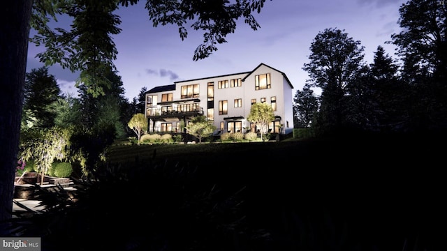 2468 River Rd, New Hope, PA 18938 - back of property featuring a balcony and stucco siding