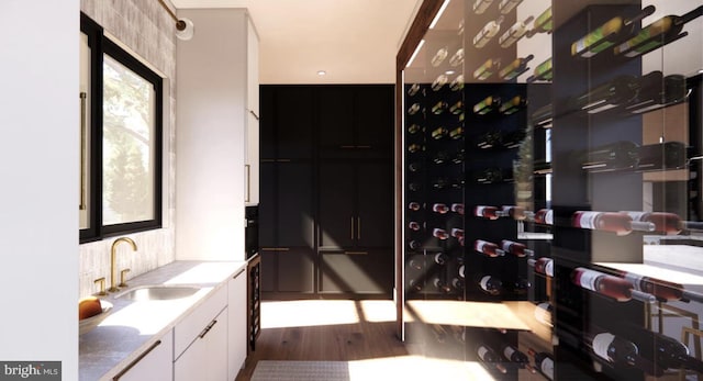 2468 River Rd, New Hope, PA 18938 - wine area featuring a sink and wood finished floors