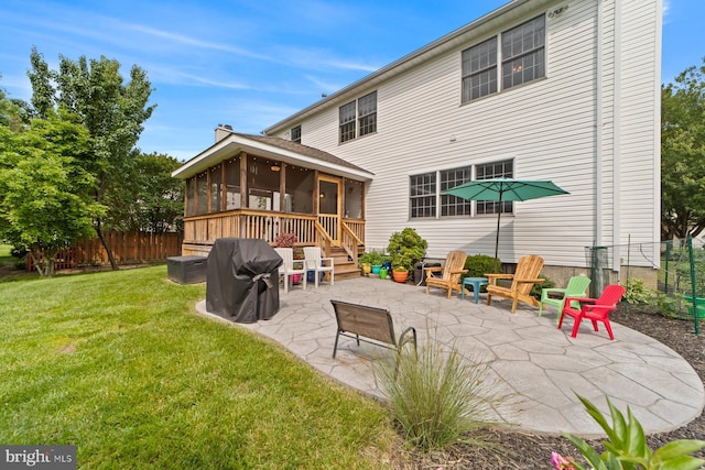 114 Ketterer Ct, Lawrence, NJ 08648 - back of house with a sunroom, a patio area, and a chimney