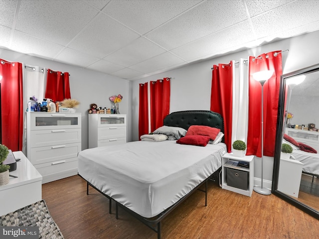 332 W Maple St, York, PA 17401 - bedroom with a paneled ceiling and wood finished floors