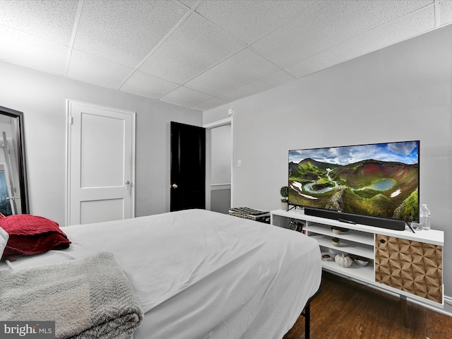 332 W Maple St, York, PA 17401 - bedroom with a drop ceiling and dark wood-type flooring