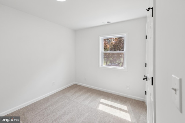 6612 Jacks Ct, Mount Airy, MD 21771 - carpeted empty room featuring baseboards and a barn door