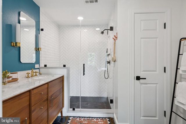 1206 N Pitt St, Alexandria, VA 22314 - full bathroom with vanity, a stall shower, tile patterned flooring, and recessed lighting