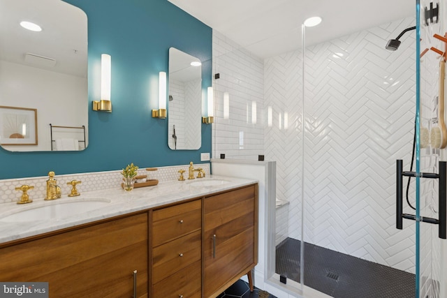 1206 N Pitt St, Alexandria, VA 22314 - full bathroom featuring double vanity, a shower stall, and recessed lighting
