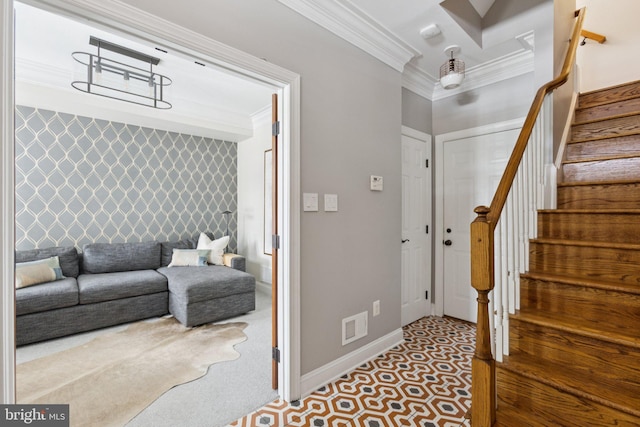 1206 N Pitt St, Alexandria, VA 22314 - foyer entrance featuring crown molding, wallpapered walls, stairway, and an accent wall