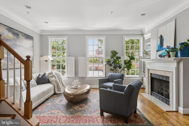 1206 N Pitt St, Alexandria, VA 22314 - living room featuring wood finished floors, a high end fireplace, crown molding, and stairway