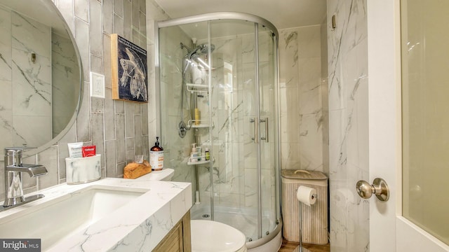 108 Montpelier Ave Unit 214, Atlantic City, NJ 08401 - full bathroom with a marble finish shower, vanity, and tile walls