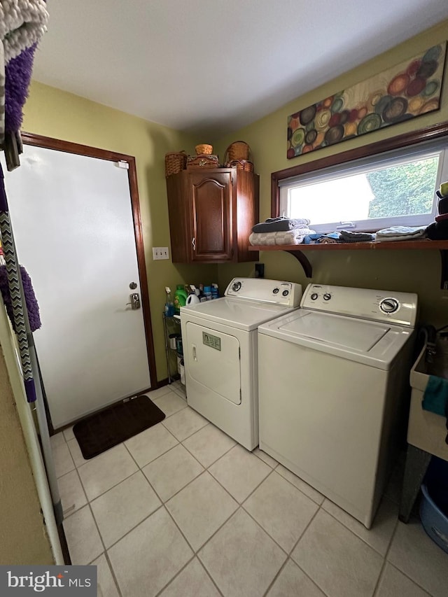 82 Blue Fox Ln, Richboro, PA 18954 - washroom featuring cabinet space, washer and clothes dryer, and light tile patterned floors