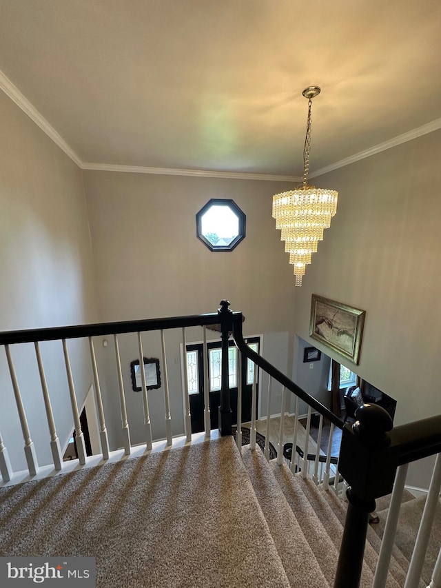 82 Blue Fox Ln, Richboro, PA 18954 - staircase with healthy amount of natural light, a chandelier, carpet flooring, and crown molding
