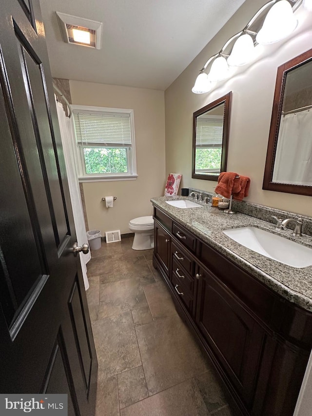 82 Blue Fox Ln, Richboro, PA 18954 - full bath with double vanity, a shower with shower curtain, and stone finish floors
