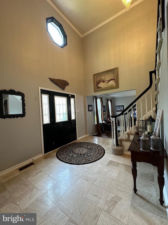 82 Blue Fox Ln, Richboro, PA 18954 - entrance foyer with crown molding, healthy amount of natural light, a high ceiling, and stairway