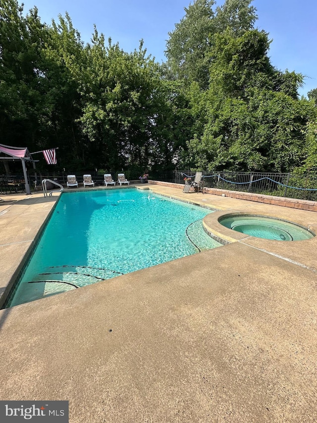 82 Blue Fox Ln, Richboro, PA 18954 - community pool featuring a patio area and an in-ground hot tub