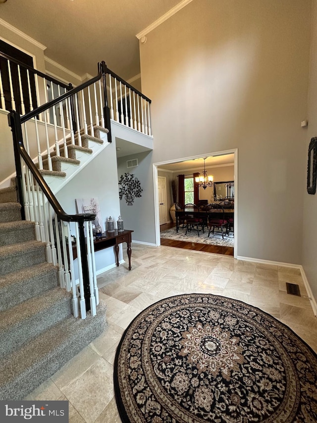 82 Blue Fox Ln, Richboro, PA 18954 - foyer featuring a chandelier, stairs, ornamental molding, and a towering ceiling
