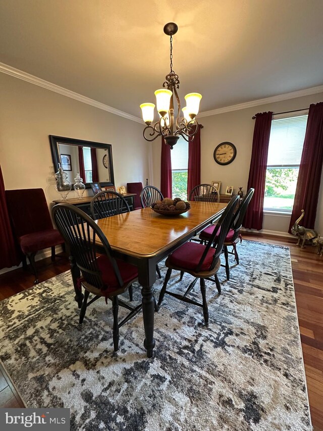 82 Blue Fox Ln, Richboro, PA 18954 - dining space with a chandelier, wood finished floors, and ornamental molding