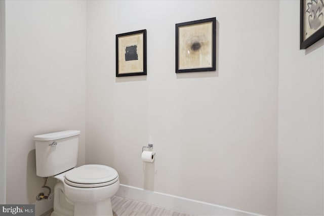 1761 Old Meadow Rd Unit 412, Mclean, VA 22102 - bathroom featuring toilet and baseboards