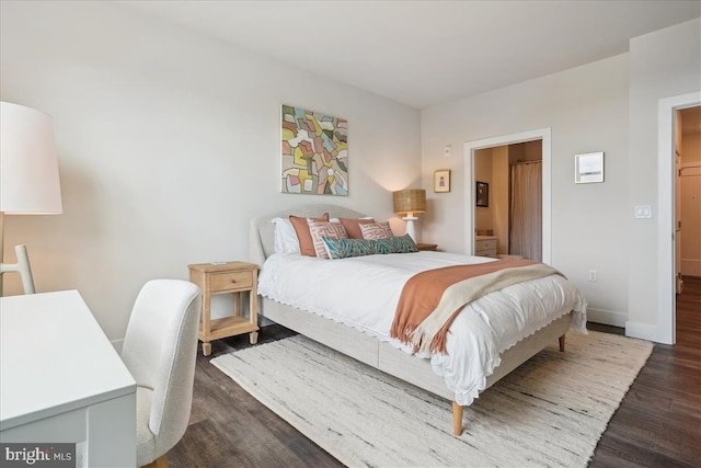1761 Old Meadow Rd Unit 412, Mclean, VA 22102 - bedroom with dark wood finished floors and ensuite bathroom
