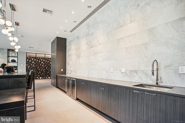 1761 Old Meadow Rd Unit 412, Mclean, VA 22102 - bar with beverage cooler and tile walls