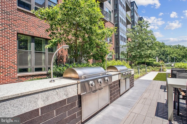 1761 Old Meadow Rd Unit 412, Mclean, VA 22102 - view of patio / terrace with exterior kitchen