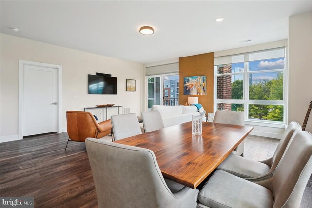 1761 Old Meadow Rd Unit 412, Mclean, VA 22102 - dining area with dark wood-style floors and baseboards