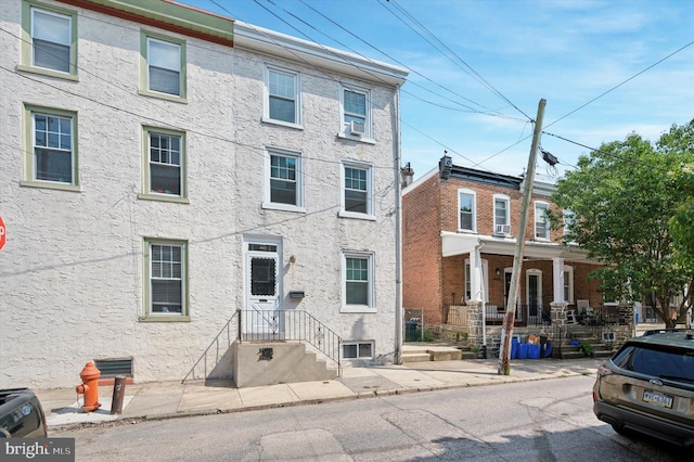 445 Dupont St, Philadelphia, PA 19128 - townhome / multi-family property with stucco siding and cooling unit