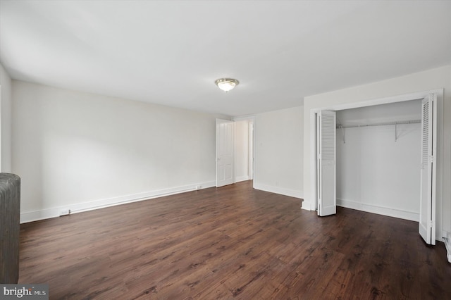 445 Dupont St, Philadelphia, PA 19128 - unfurnished bedroom featuring dark wood-style flooring and a closet
