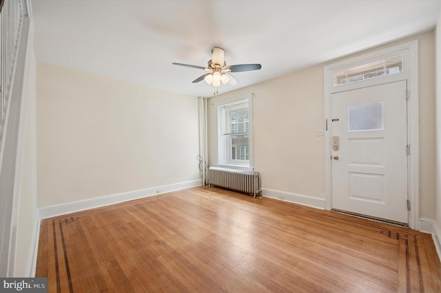 445 Dupont St, Philadelphia, PA 19128 - foyer with radiator, ceiling fan, and light wood-type flooring