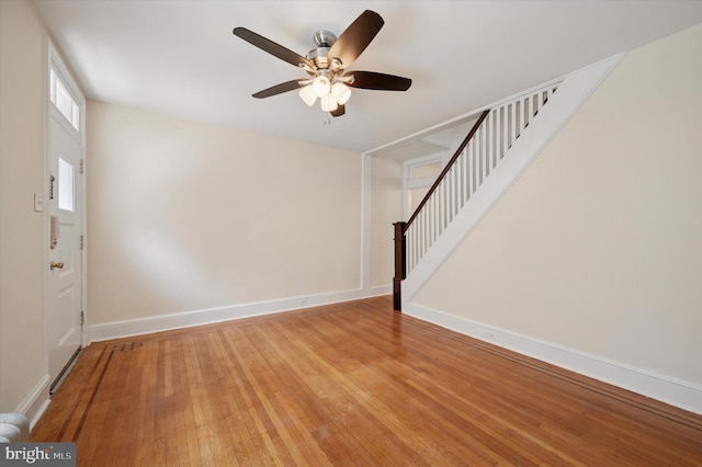 445 Dupont St, Philadelphia, PA 19128 - foyer with ceiling fan, light wood-style flooring, and stairway